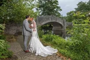 wedding couple near bridge