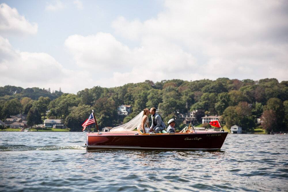 wedding couple riding a boat