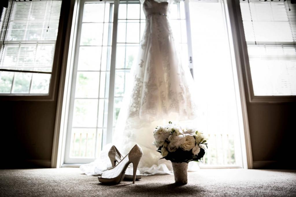 photo of bride's bouquet, shoes and dress