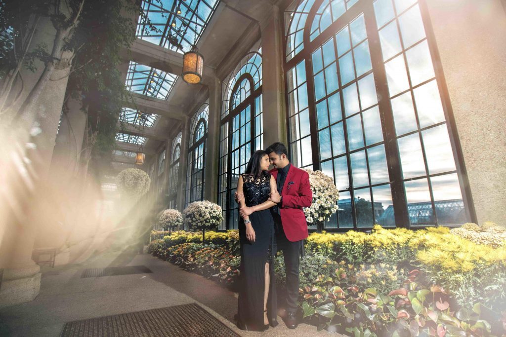 photo of loving couple in the greenhouse