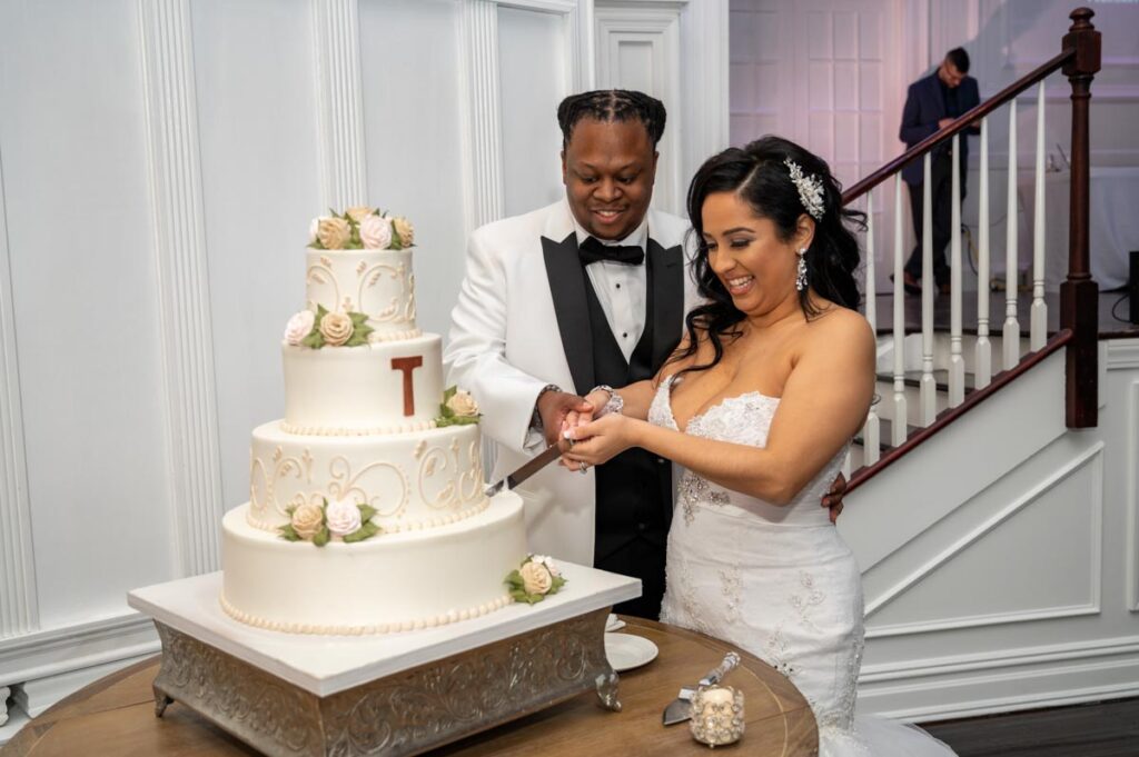 bride and groom cutting wedding cake at The Hamilton Manor, Hamilton Township, NJ