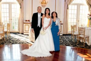 Bride and groom with parents at Crystal Plaza