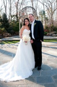 Couple exchanging vows, Crystal Plaza, Livingston, NJ