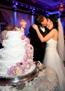 Bride and groom near cake at Crystal Plaza