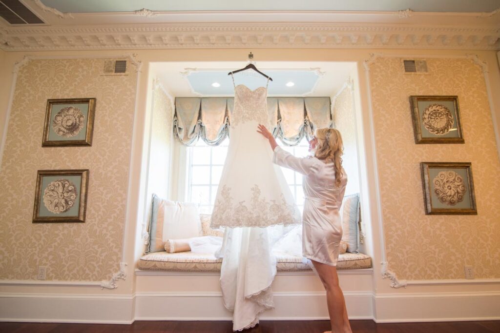 bride looking at her dress - The Ashford Estate, Allentown, New Jersey