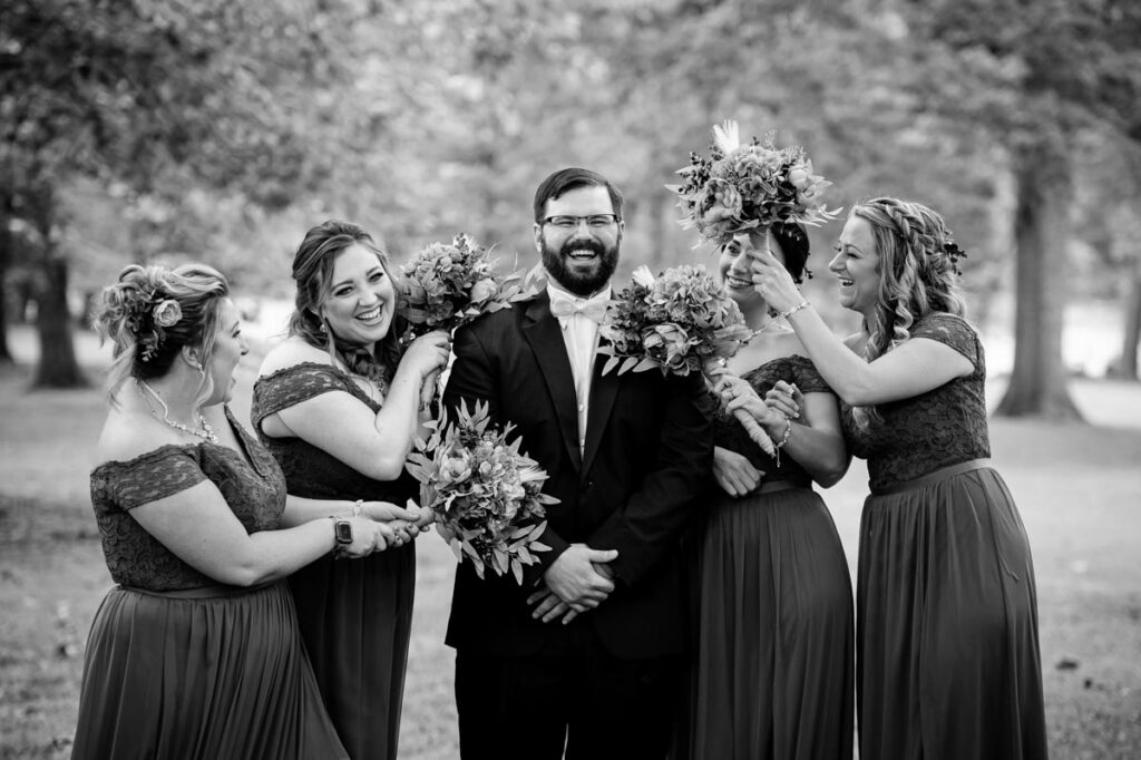 b&w photo of groom and guests at Farrington Lake, East Brunswick, NJ