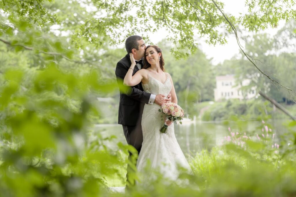 Happy Groom and bride together at Farrington Lake, East Brunswick