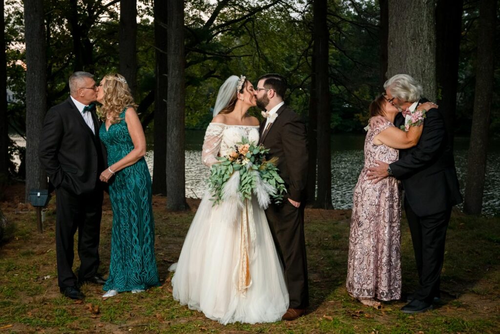 happy newlyweds with guests at Farrington Lake, East Brunswick