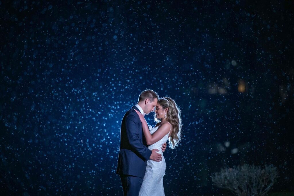 wedding couple dancing at night under a tree illuminated by lights in a New Jersey park