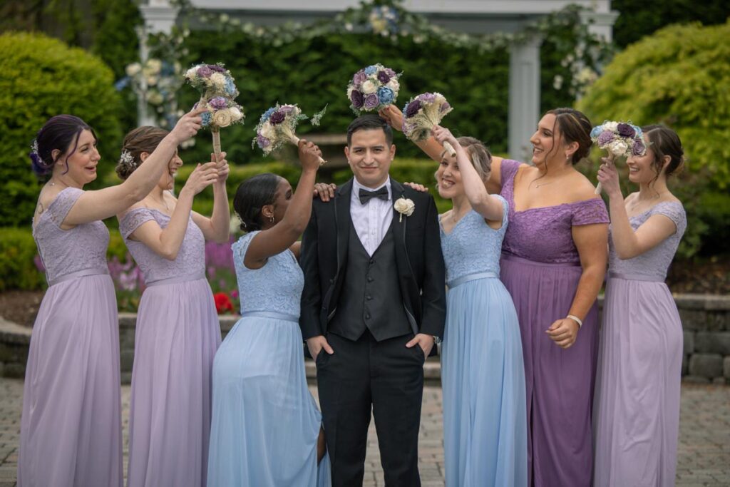 groom with bride's guests at The Mill Lakeside Manor, Spring Lake, New Jersey