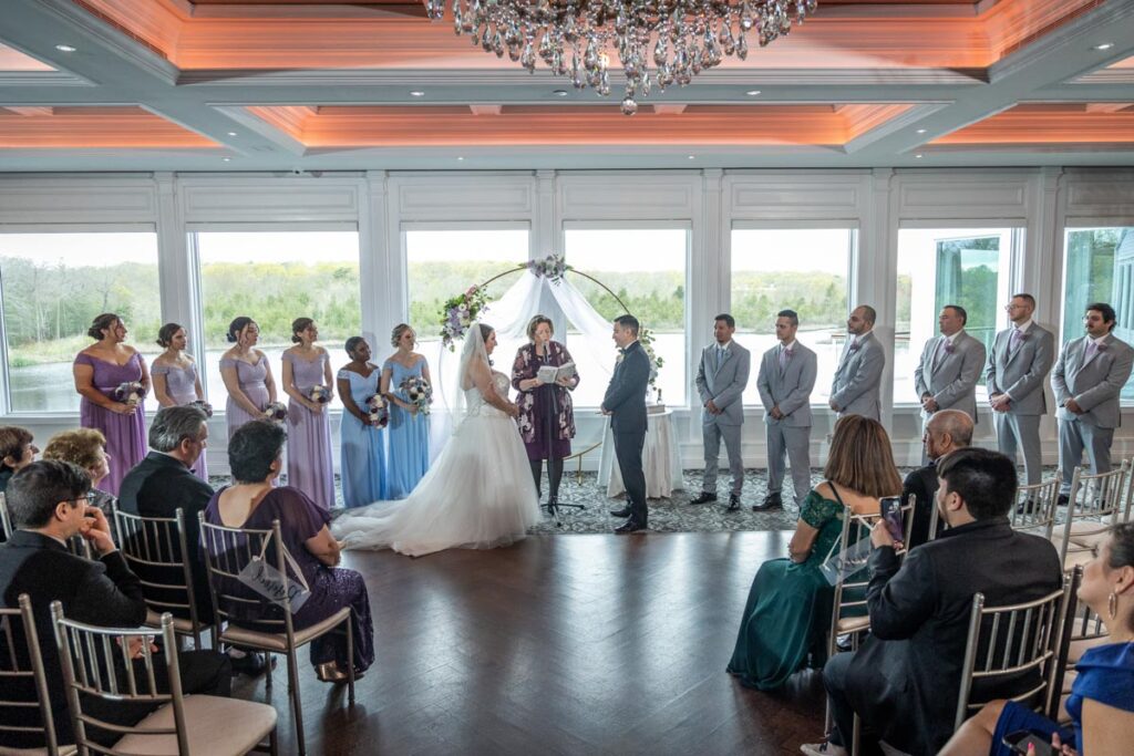 Bride and groom under arch, The Mill