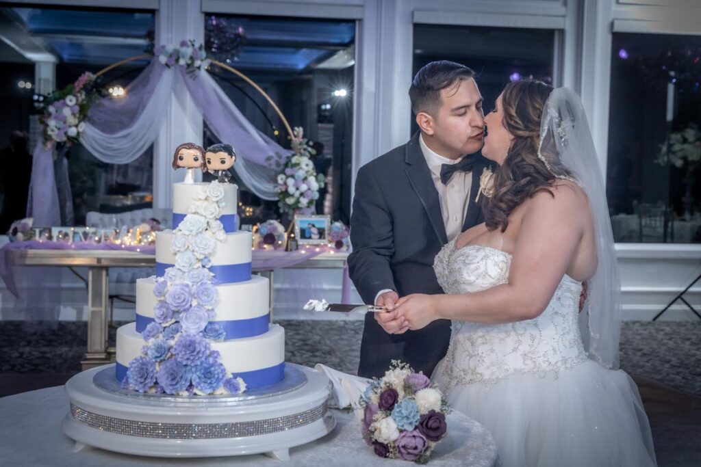 Bride and groom cutting cake, Spring Lake