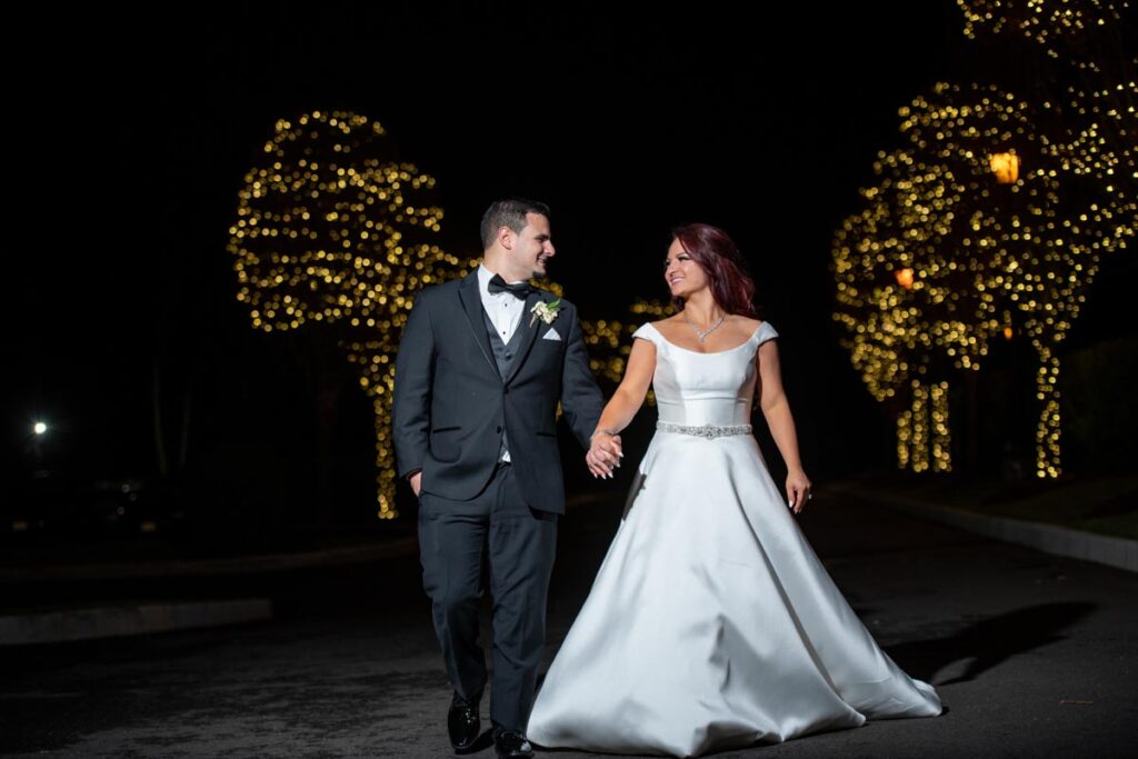 Bride and groom on the beautiful terrace at The Mill Lakeside Manor, Spring Lake, NJ
