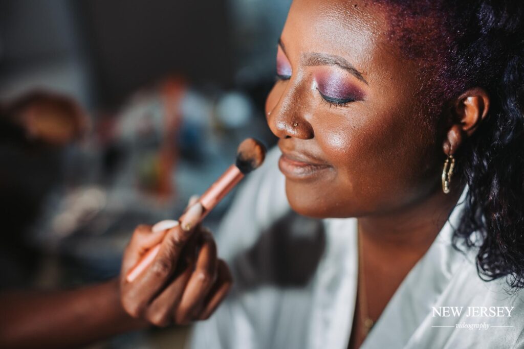bride doing makeup