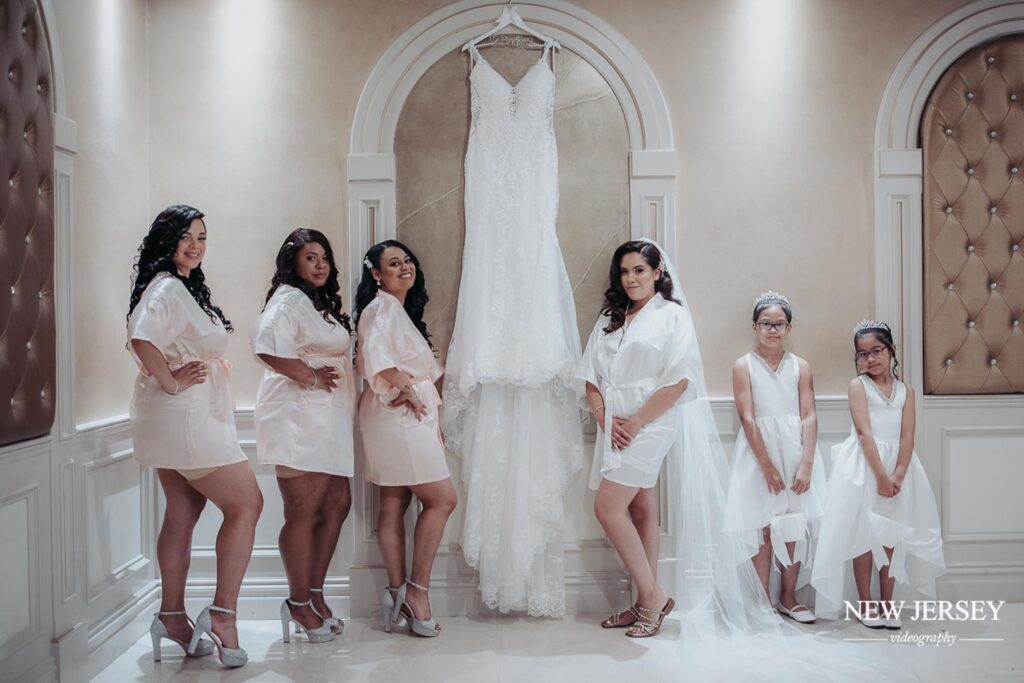 bride and guests near bride's dress - The Royal Manor, Garfield, New Jersey