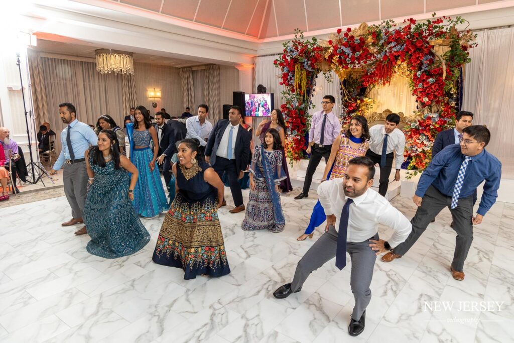 indian people dancing at the wedding