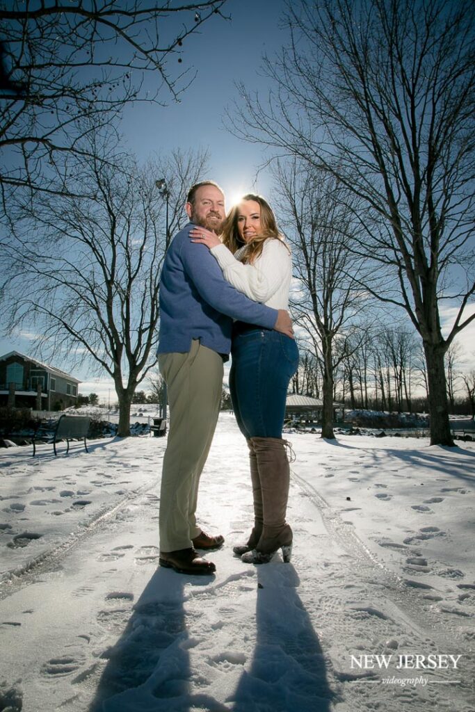 Elegant couple dressed formally for an engagement shoot