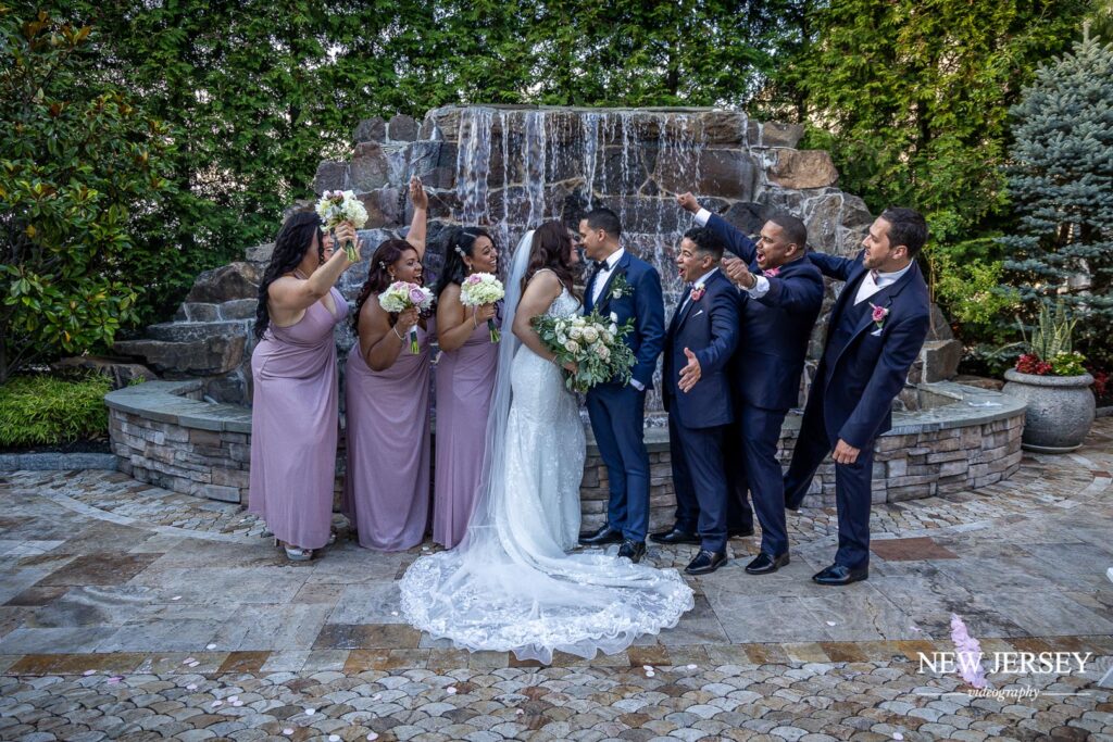 happy wedding couple with their friends