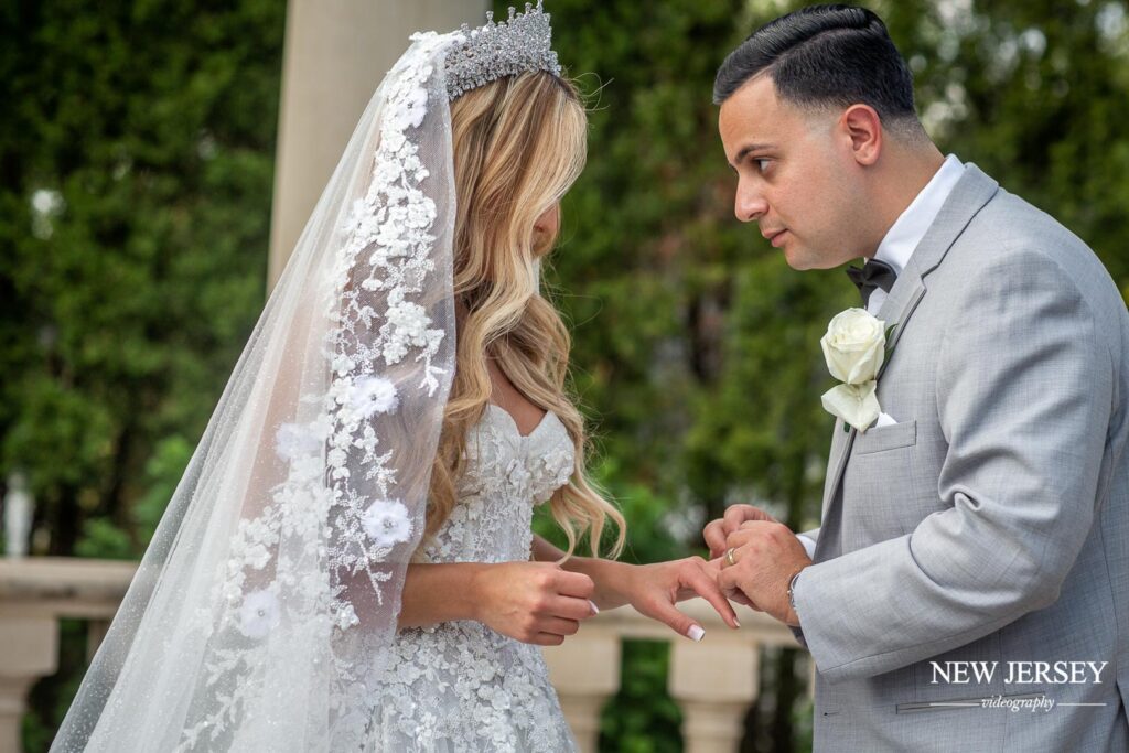 groom holding a bride's hand