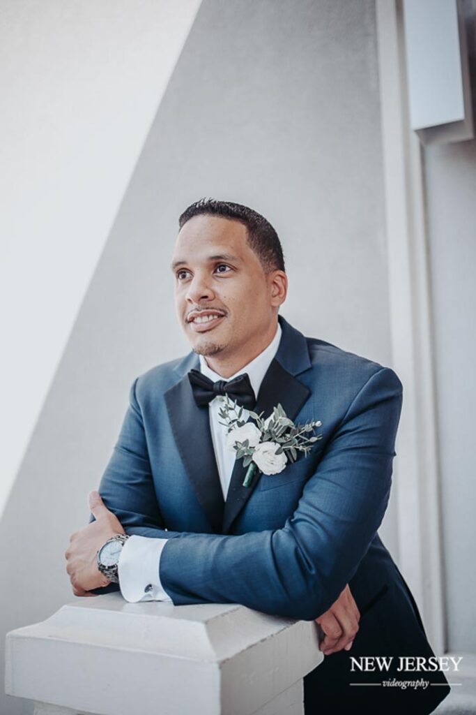 handsome groom having photosession