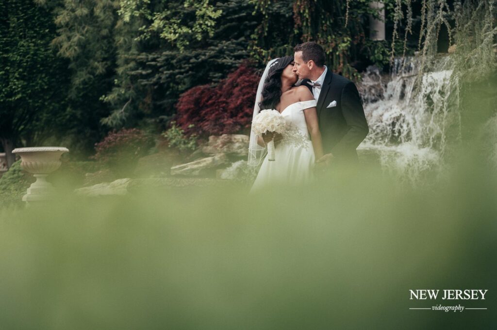 groom & bride kissing Seasons Catering, Township of Washington, NJ