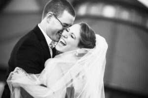 bw photo of happy wedding couple
