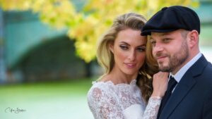 happy couple of newlyweds in a park