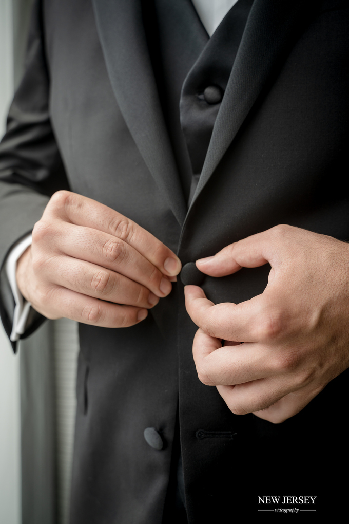 Buttoning up the jacket