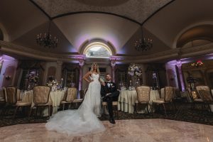 Garter Toss Fun - Pleasantdale Chateau Wedding Photo